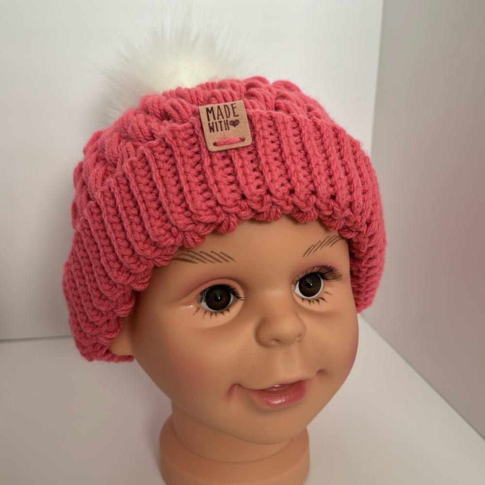 Beautiful, dark pink homemade crocheted hat.